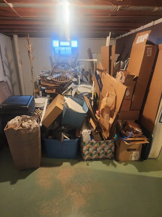 Roll-off dumpster container at job site for 2 Yard Dumpster Rental in Callender