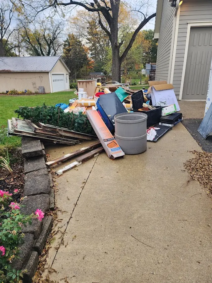 Dumpster being loaded with debris for Commercial Dumpster Rental in Callender